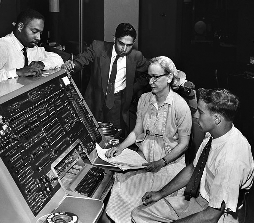 US Navy Read Admiral Grace Hopper working on an early computer