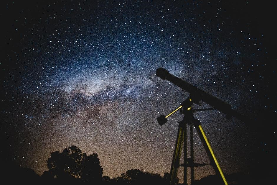 Telescope pointed towards the night sky Telescope pointed towards the night sky