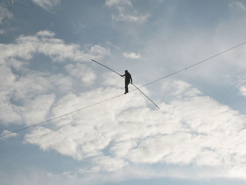 A photo of Nik Wallenda walking on a tight rope from Medieval Fare to Wonder Mountain at Canada's Wonderland- via Wikicommons.