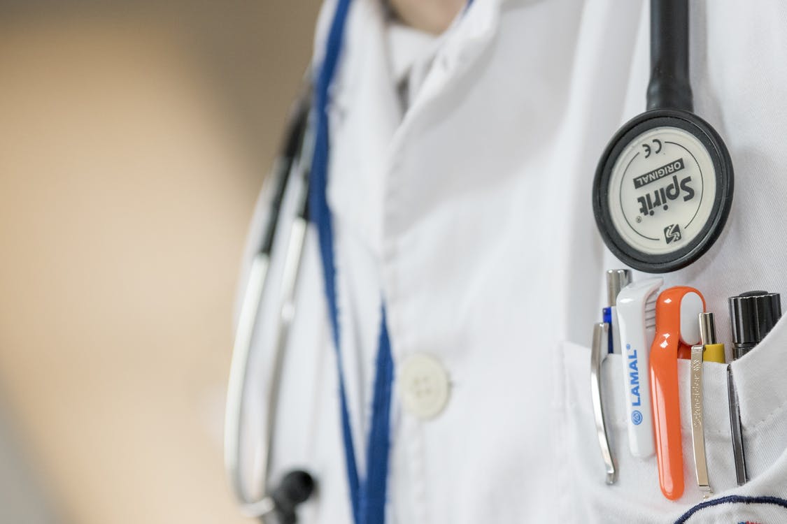 Image of a nurse showing their stethoscope